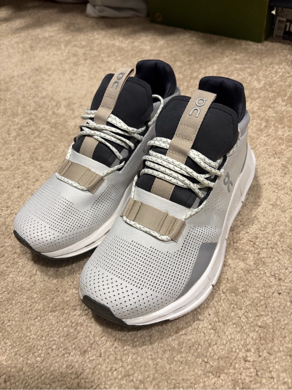 On Running White, Sand and Black Women’s Athletic Sneakers